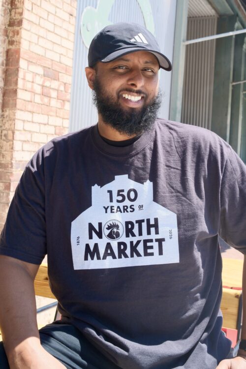 North Market 150th Barn Tee – Black with White Logo
